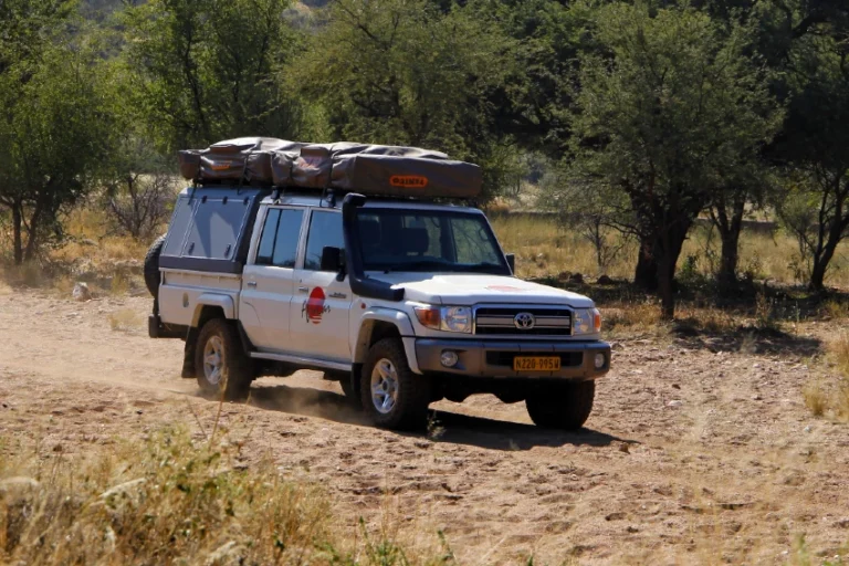 Toyota Land Cruiser with camping equipment from AfriCar Car Hire. Find and book on Arid.
